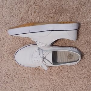 White lace up keds style shoes